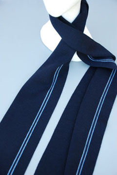 Scarf with narrow stripes running entire length