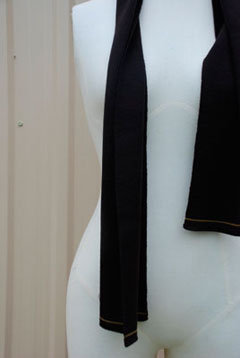 Scarf with narrow horizontal stripes at ends